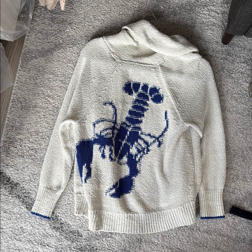 White Sweater with Blue Scorpion Design